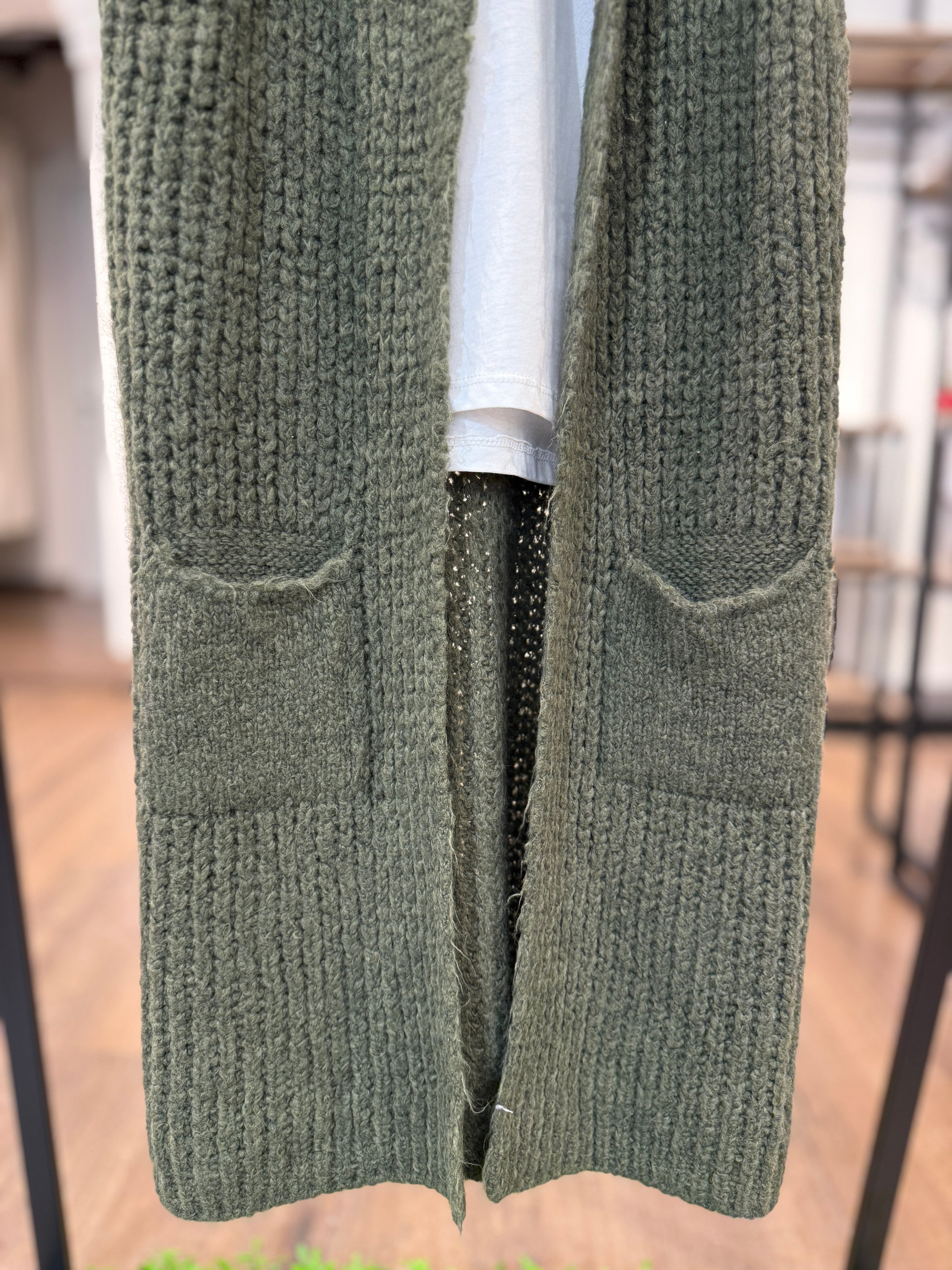 Gilet lungo in maglia con tasche