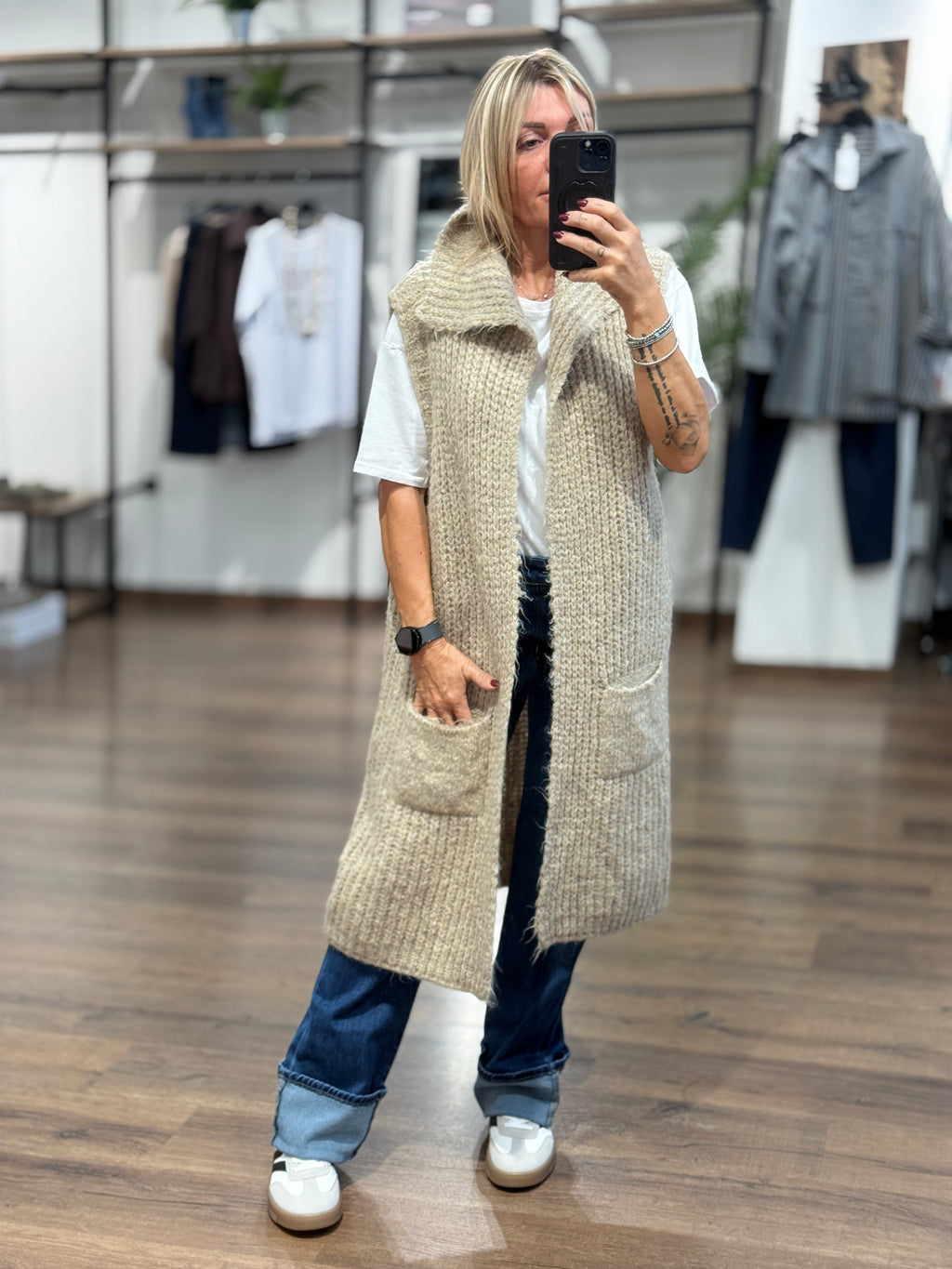 Gilet lungo in maglia con tasche