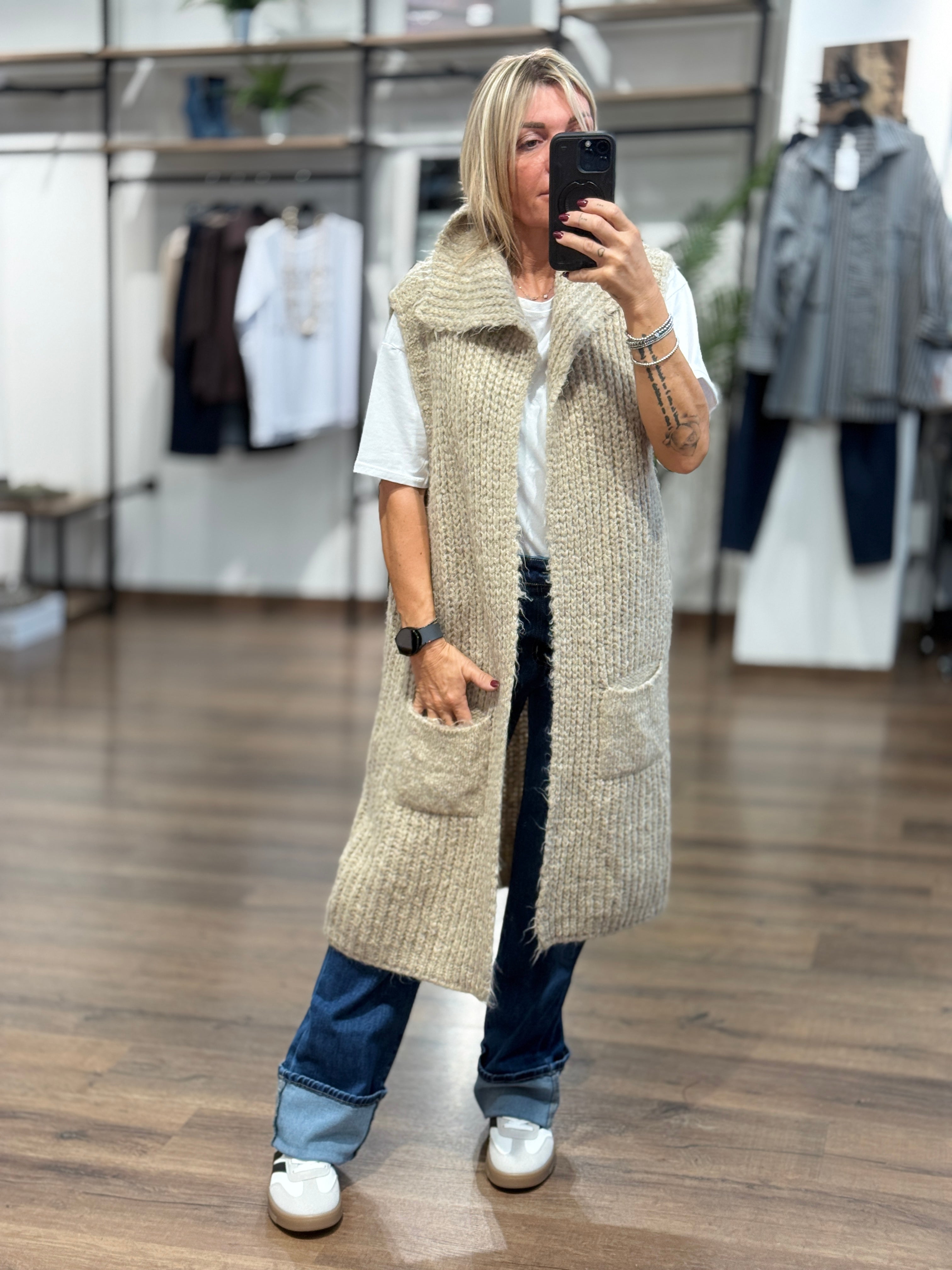 Gilet lungo in maglia con tasche