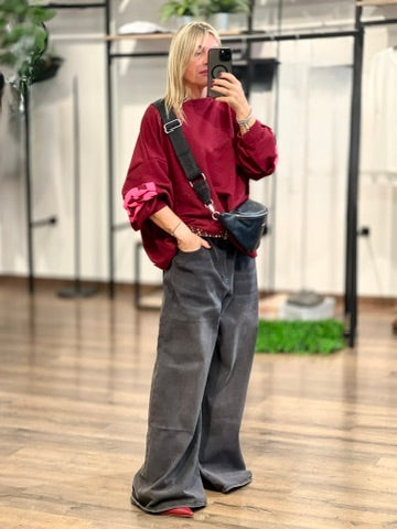 Jeans nero slavato a palazzo