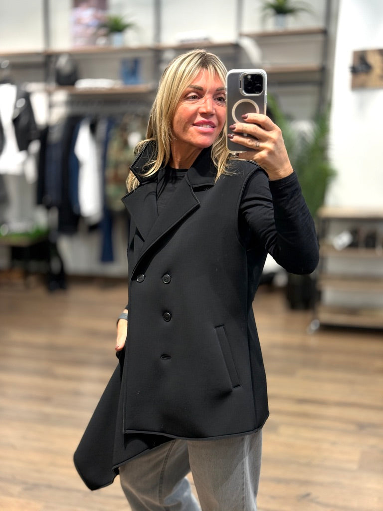 Gilet asimmetrico in taglio vivo