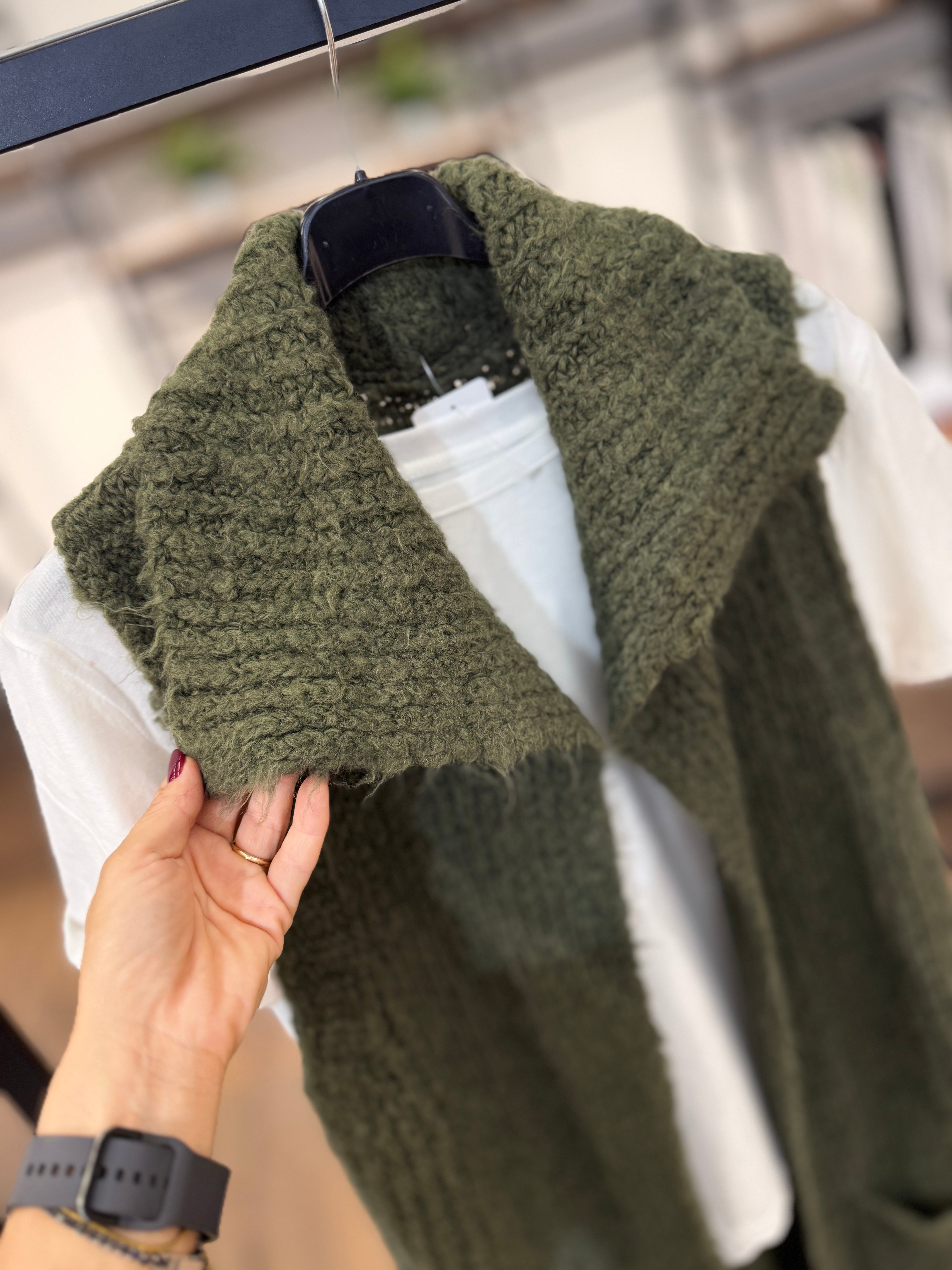 Gilet lungo in maglia con tasche