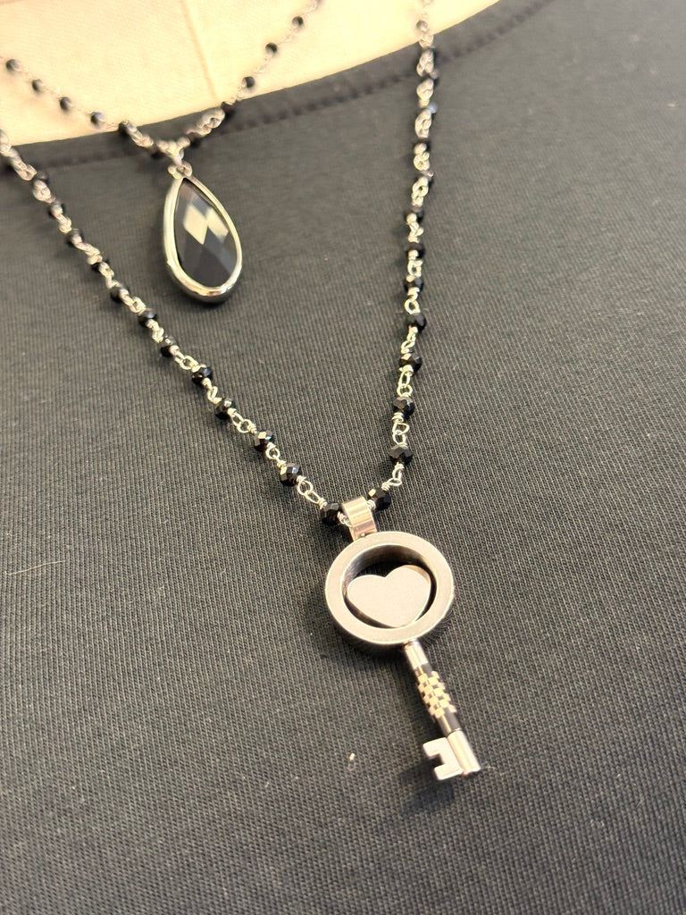 Collana con ciondolo a forma di chiave