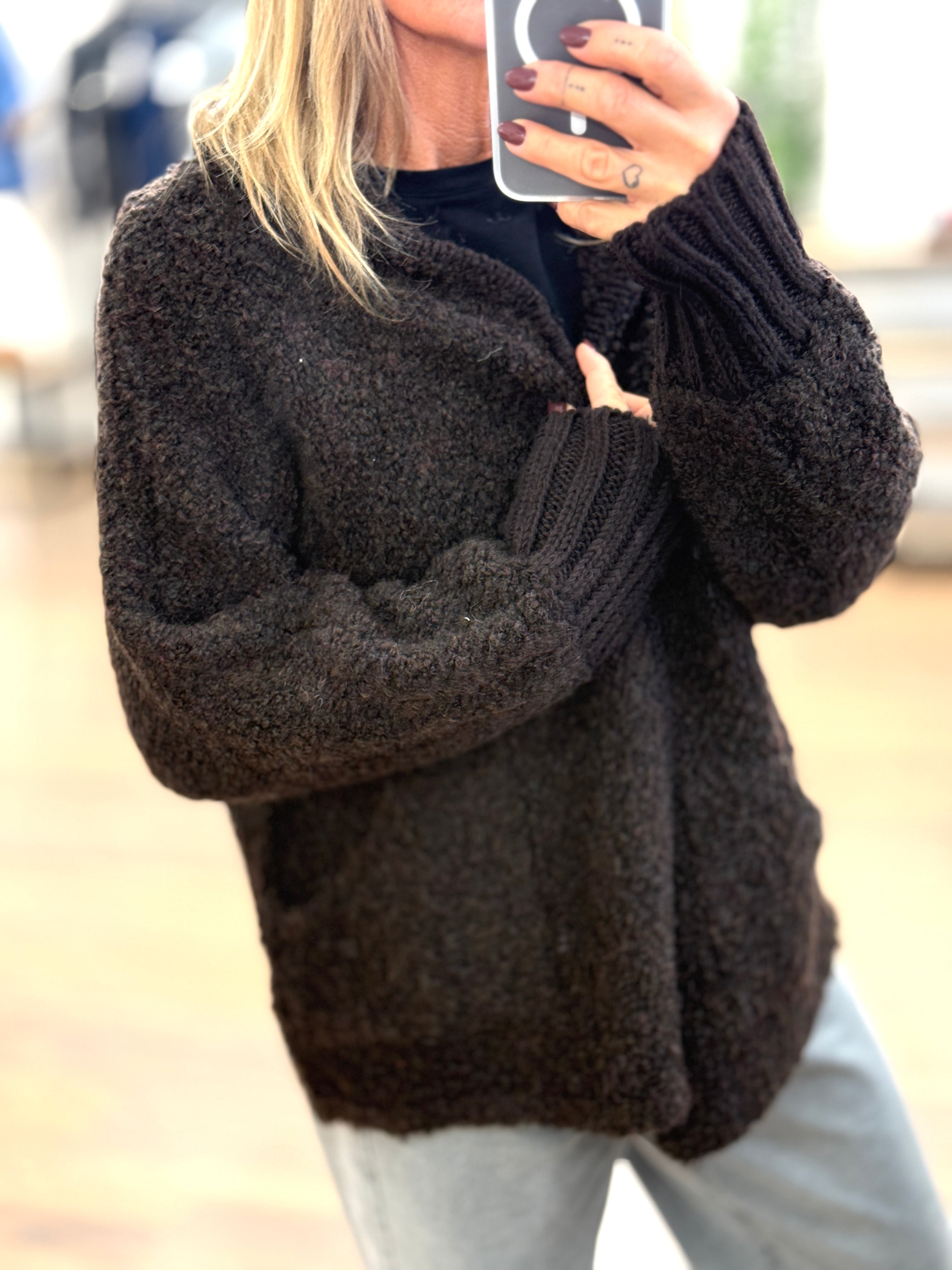 Maglia effetto boucle' con zip e cappuccio
