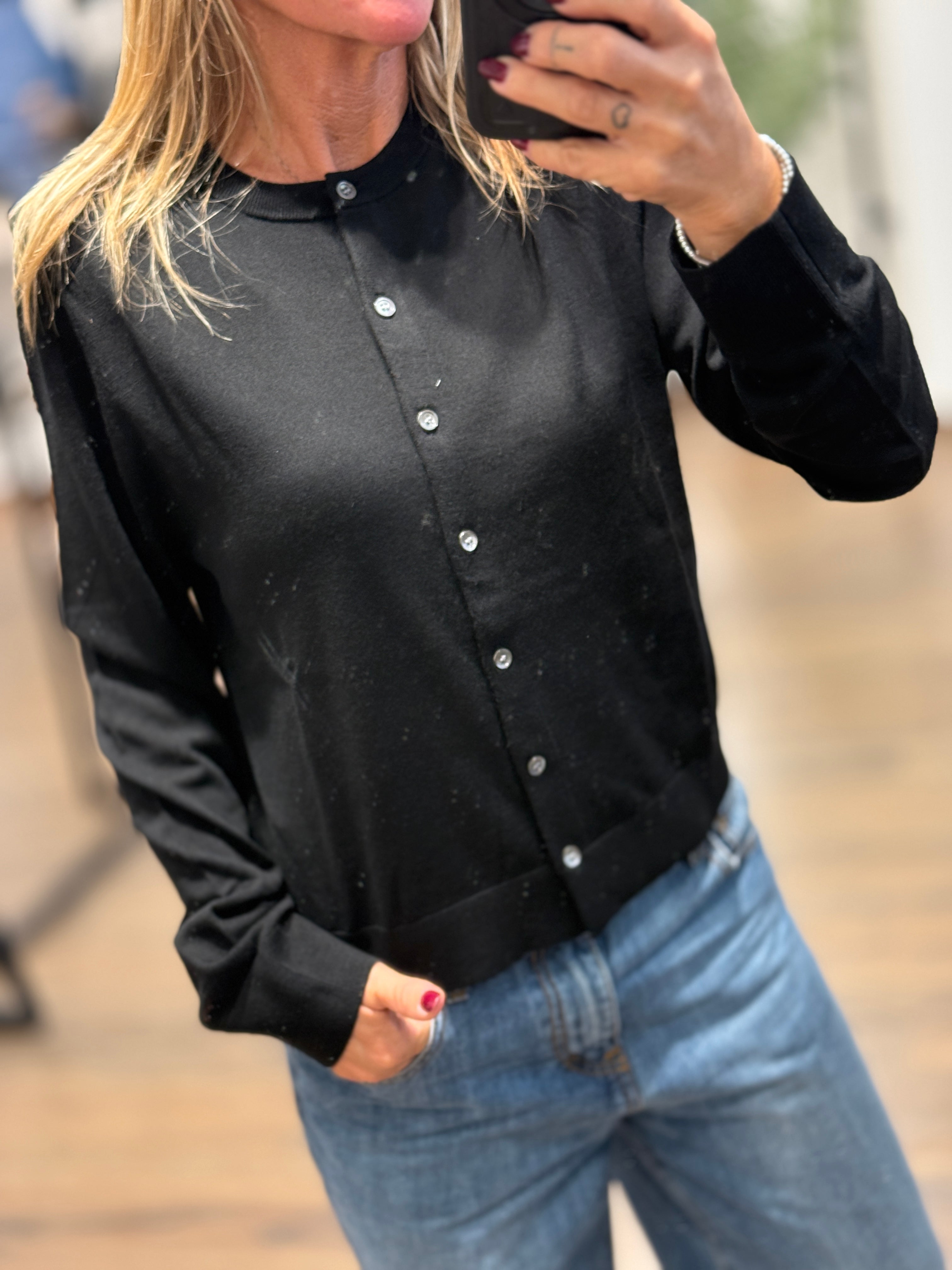 Maglia con bottoni girocollo