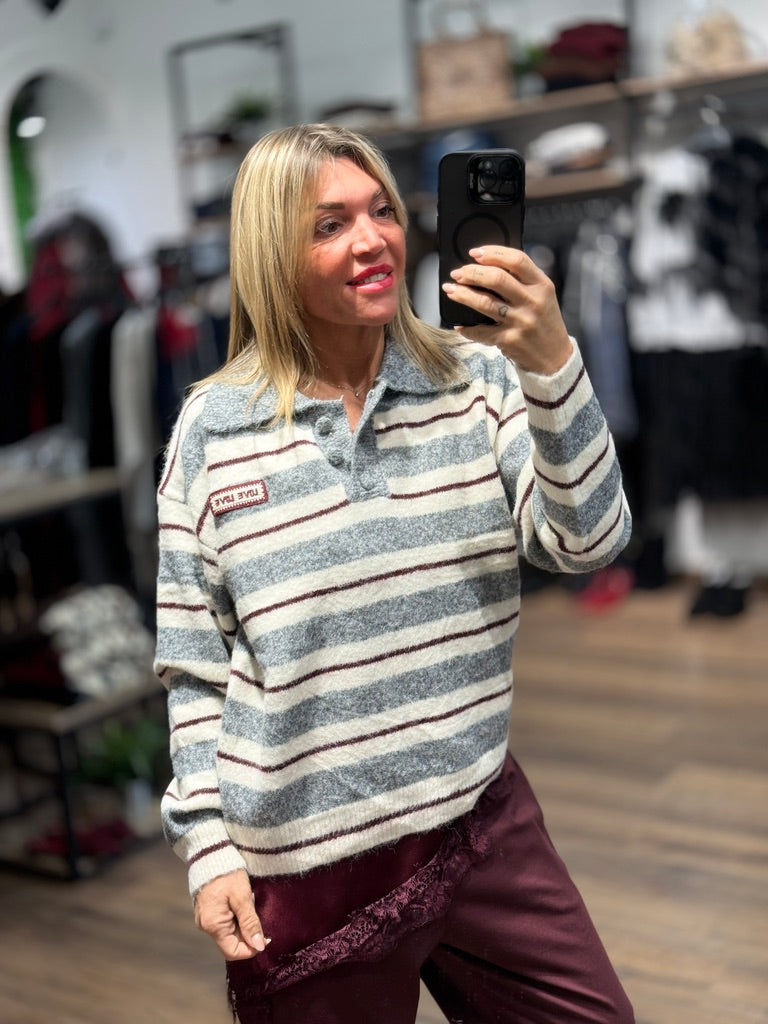 Maglioncino a polo a righe