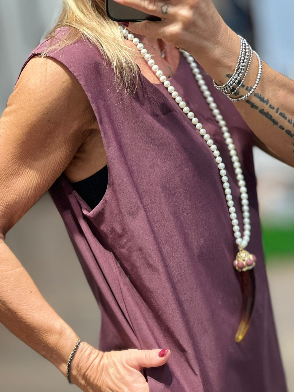 Collana di perle con corno