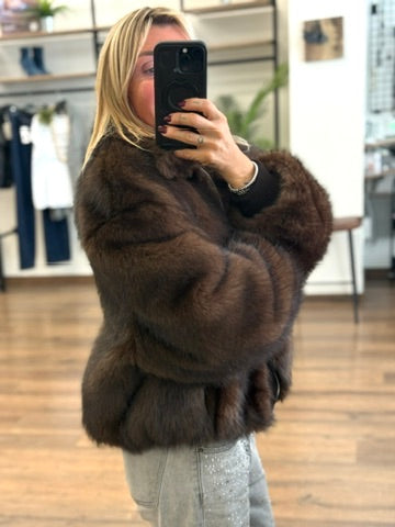 Bomber in ecopelliccia con polsino in maglia