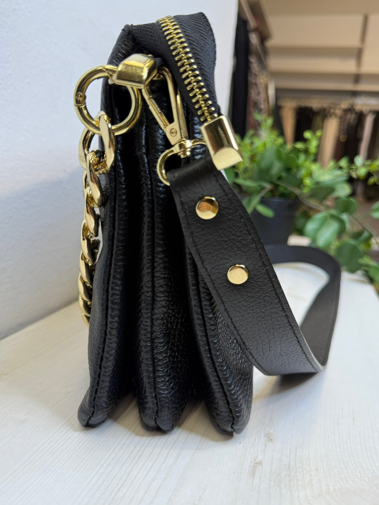 Borsa con tripla tasca in pelle