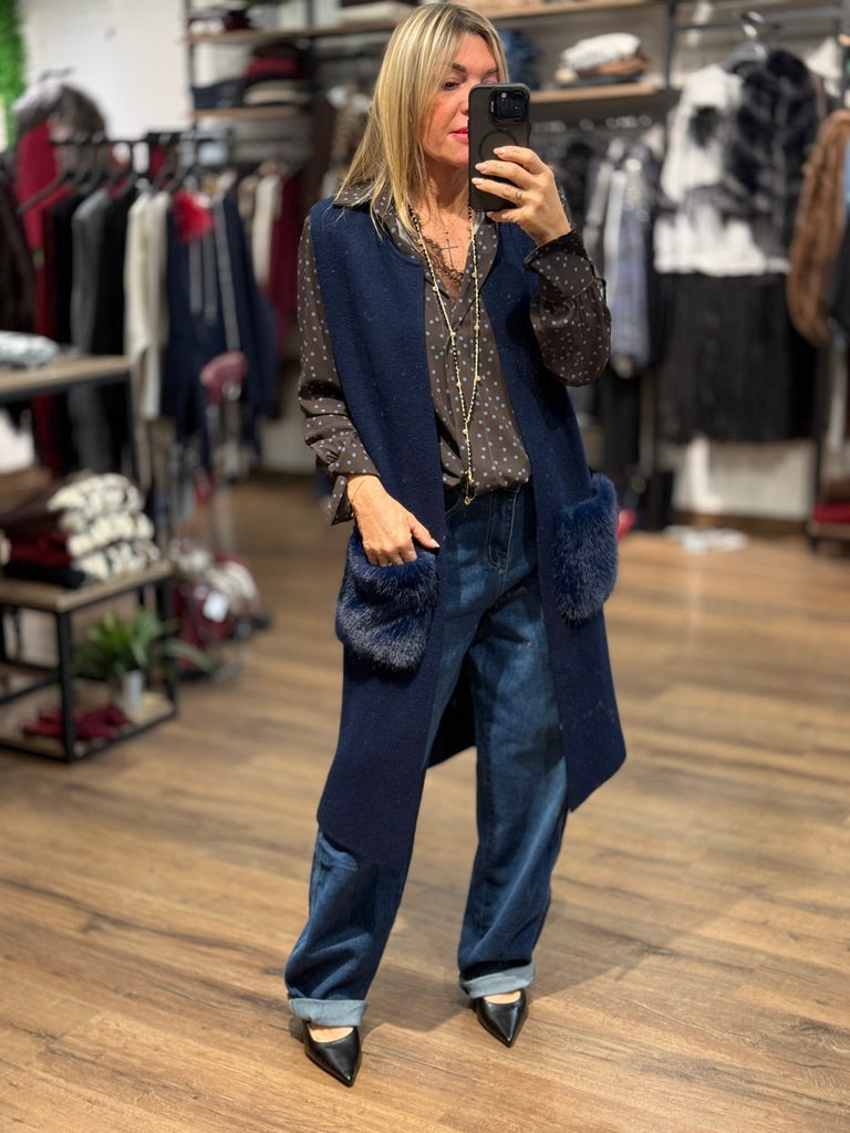 Gilet lungo in maglia con tasche in ecopelo