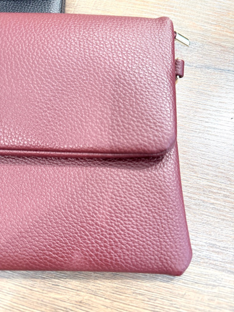Pochette con chiusura a scomparsa