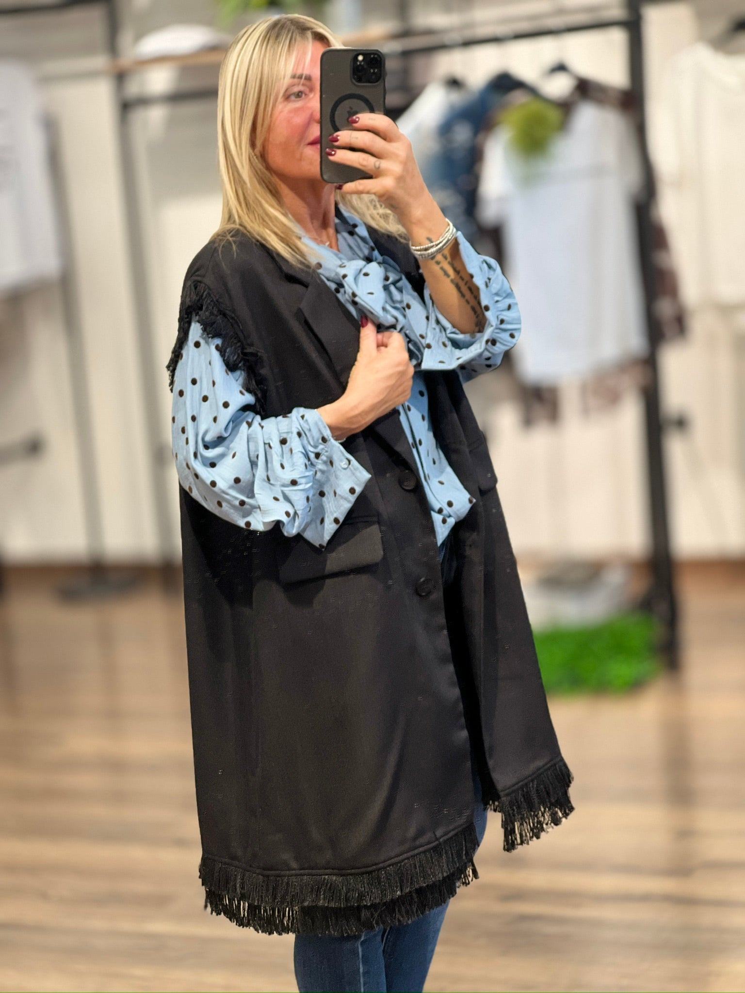Gilet lungo con frange