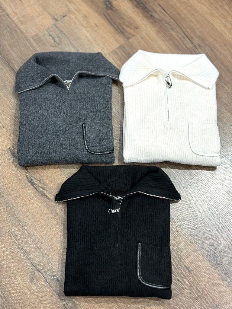Maglia collo alto con zip e taschino