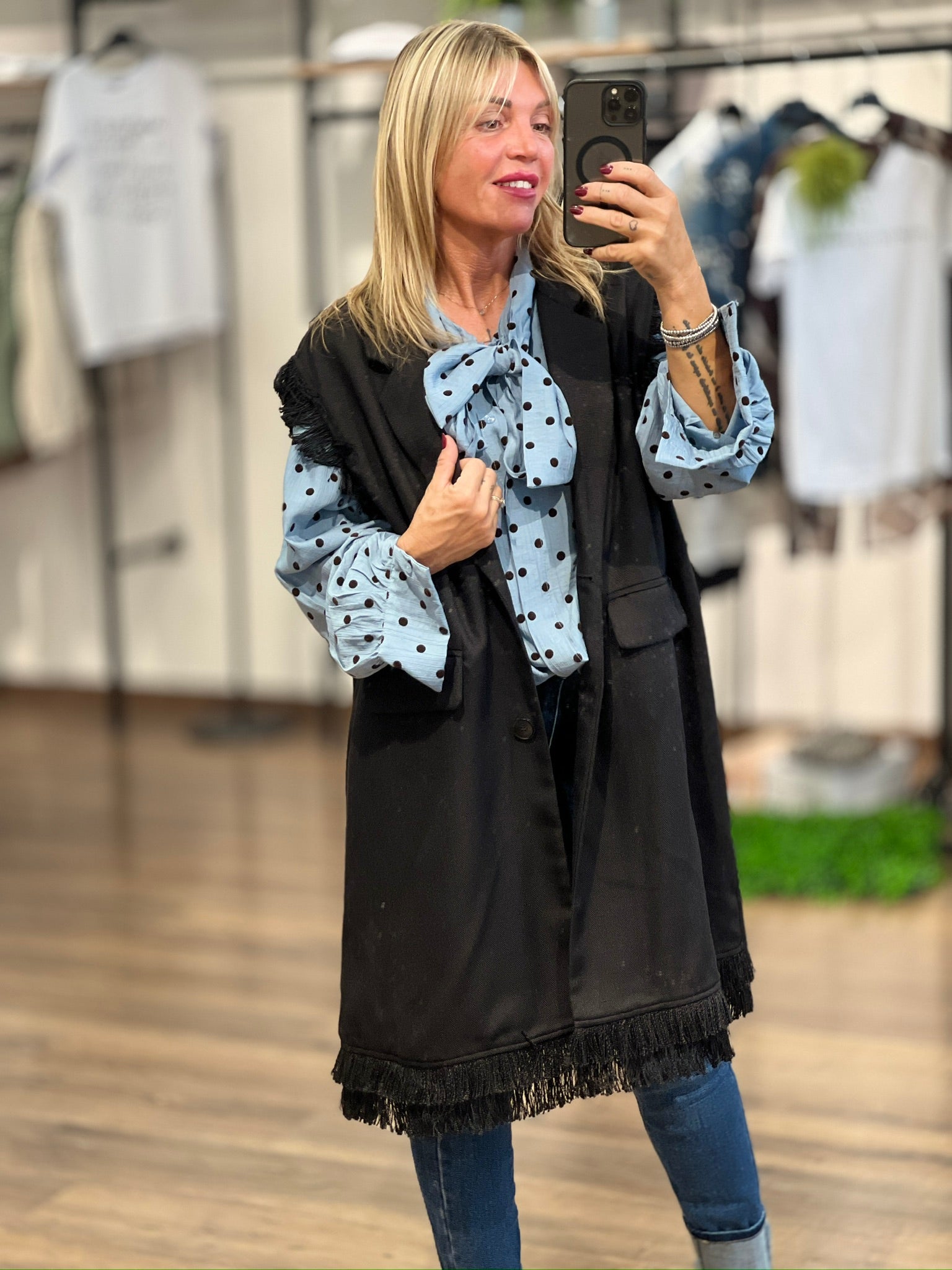 Gilet lungo con frange