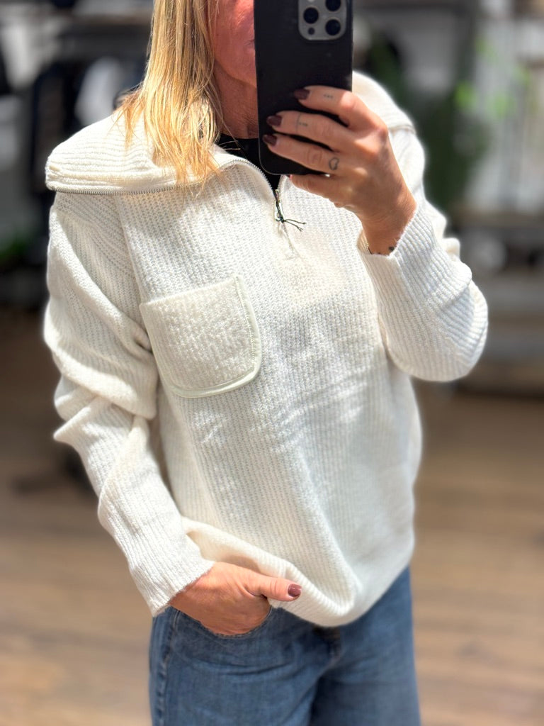 Maglia collo alto con zip e taschino