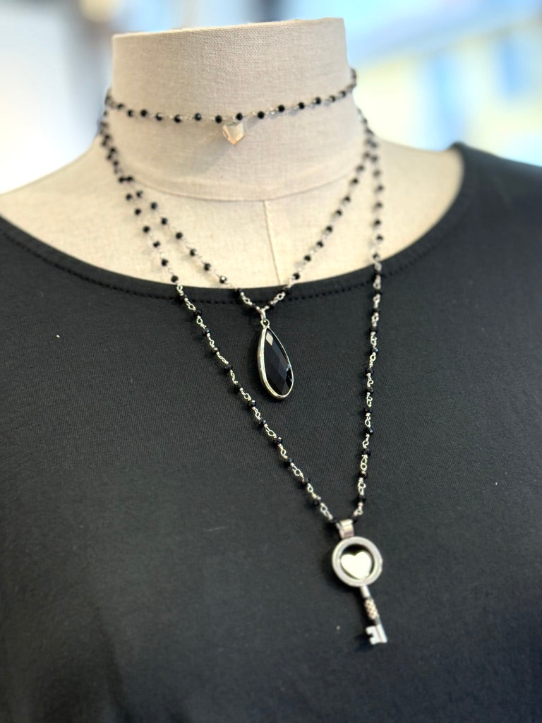 Collana con ciondolo a forma di chiave