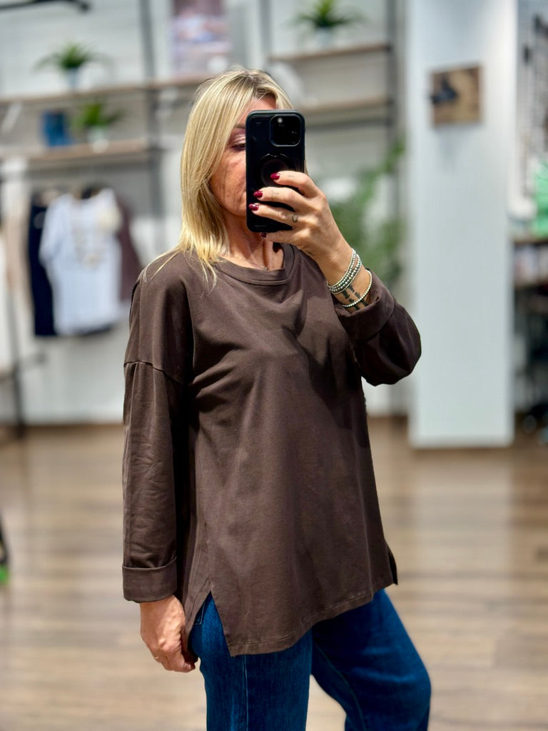 T-shirt manica lunga con bottoni dietro