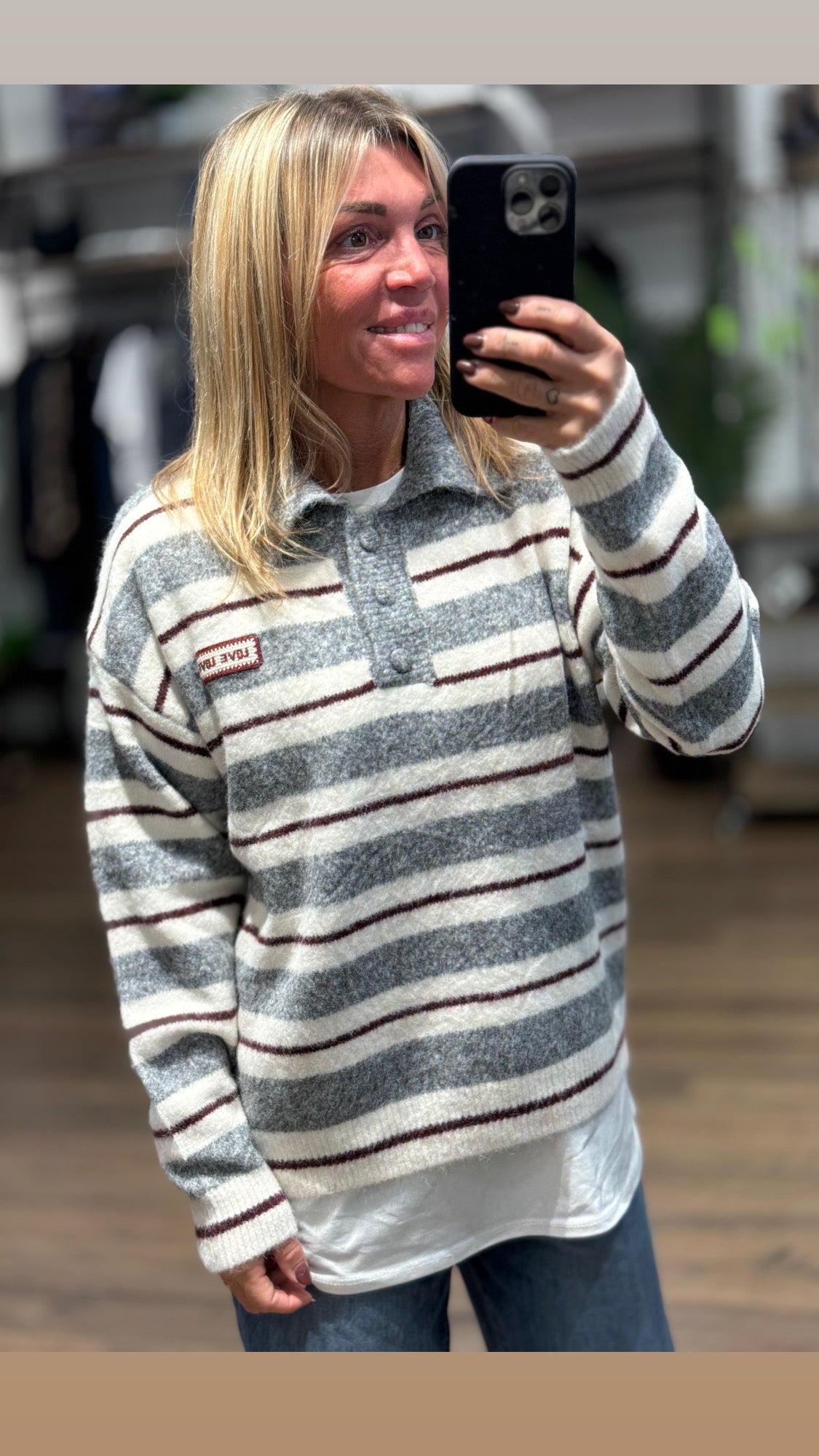 Maglioncino a polo a righe