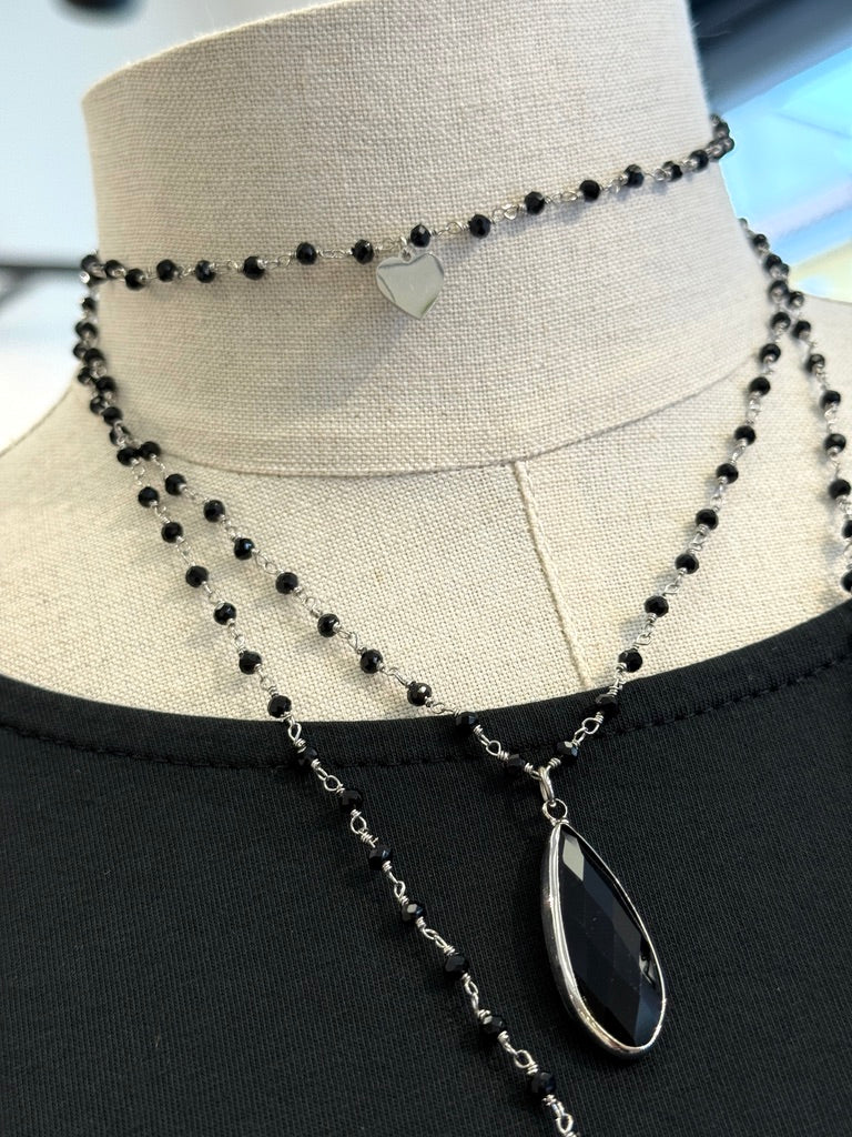 Collana con ciondolo a forma di chiave