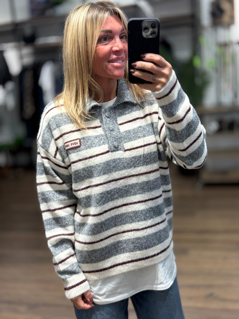 Maglioncino a polo a righe