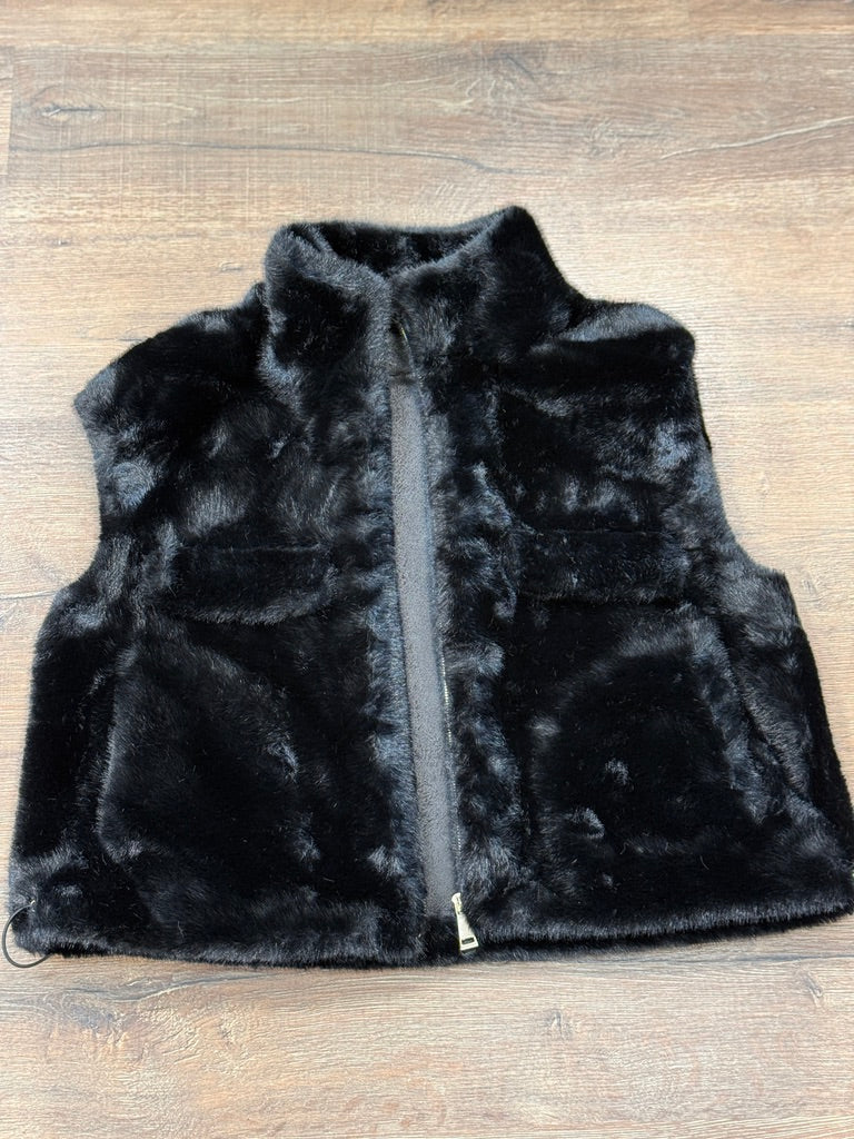 Gilet ecopelliccia con zip e laccetti