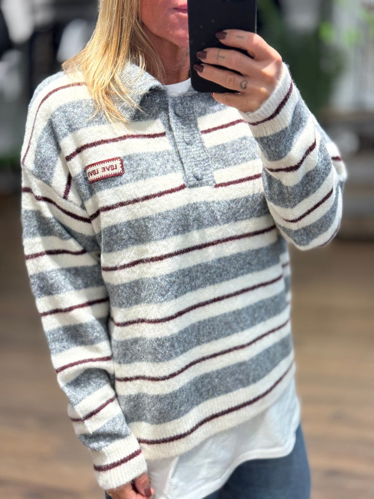Maglioncino a polo a righe