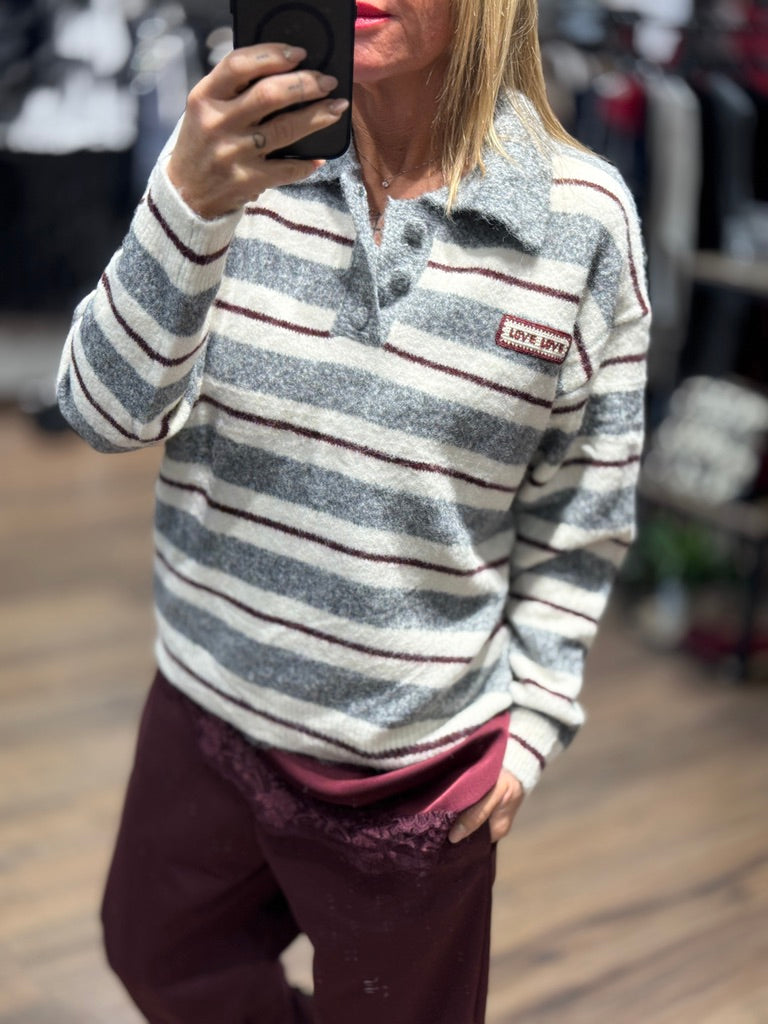 Maglioncino a polo a righe