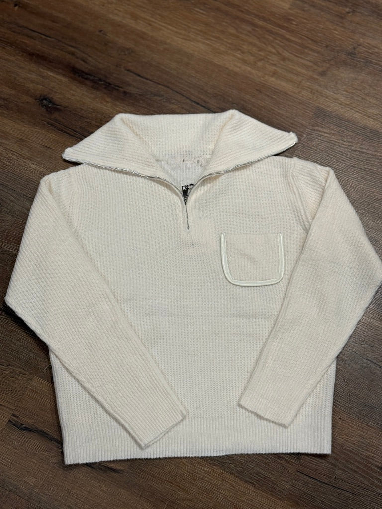 Maglia collo alto con zip e taschino