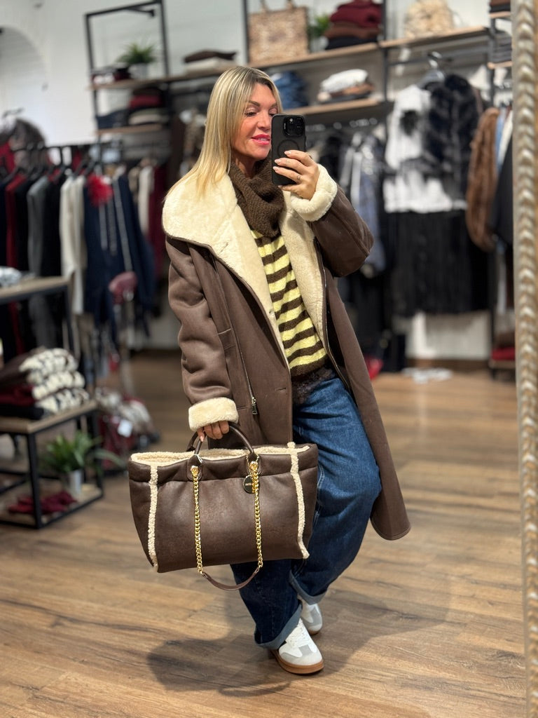 Cappotto montone con zip reversibile