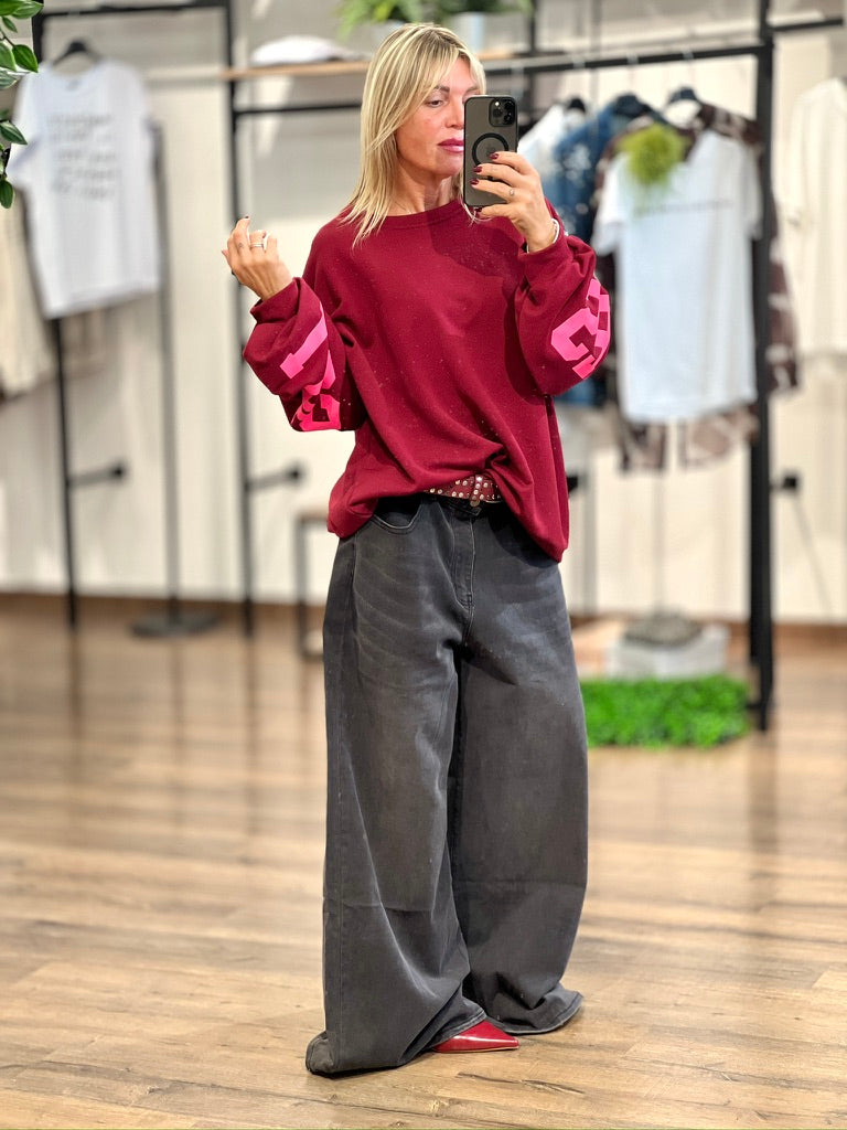 Jeans nero slavato a palazzo