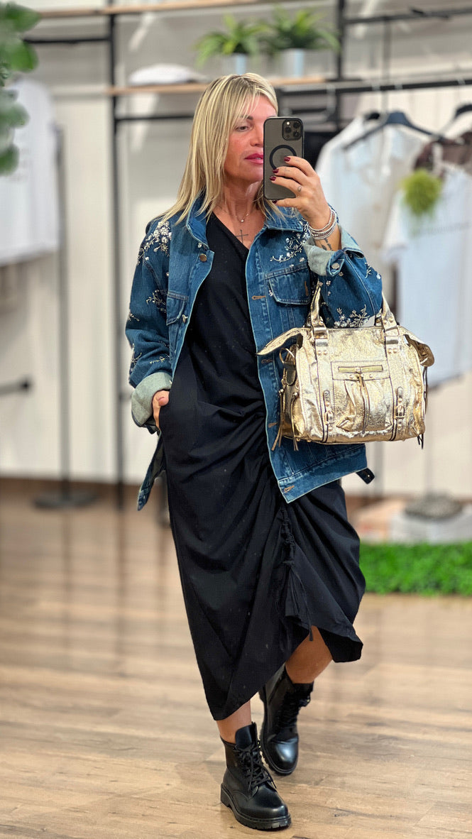 Abito con drappeggio